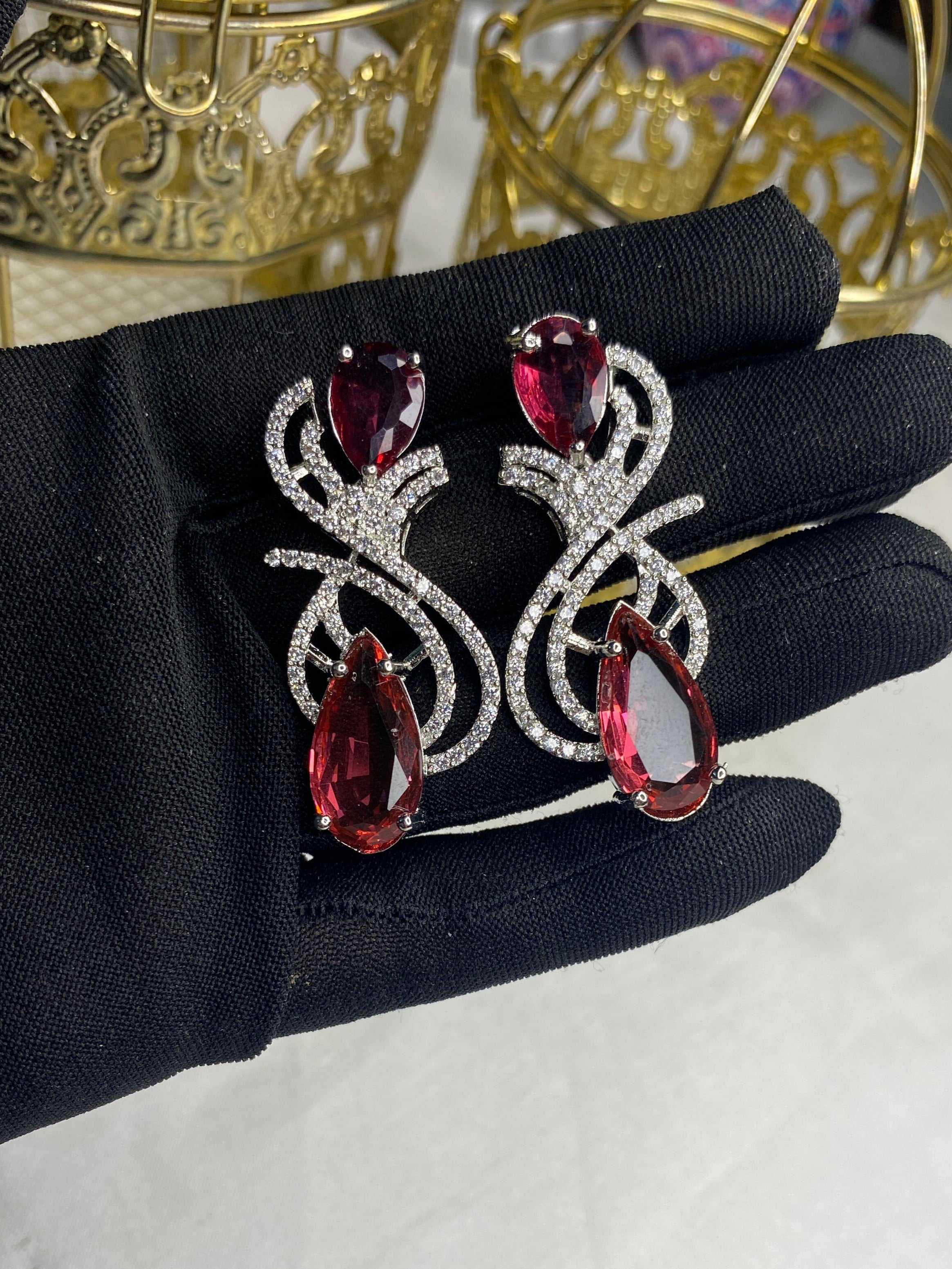 Ruby Gemstone Swirl Earrings